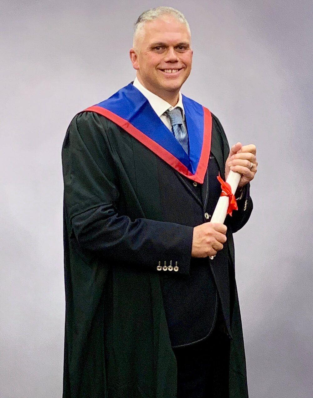 Moray Robertson, founder and director of MRES, at his graduation